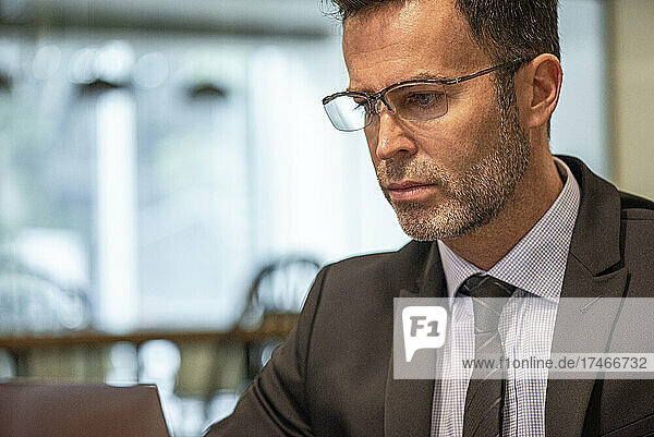 Close-up of thoughtful senior man in office