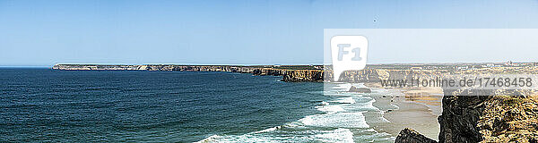 Panoramic view of Atlantic Ocean and cliffs of Praia do Tonel