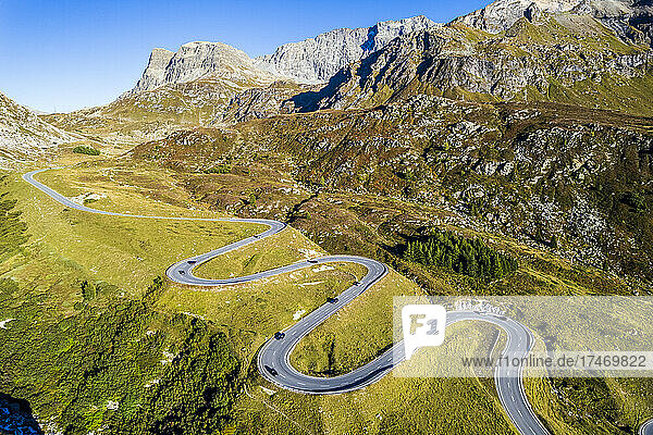 Winding road by mountains at Graubunden  Switzerland