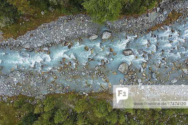 Drone view of Ova da Morteratsch river flowing through Val Morteratsch
