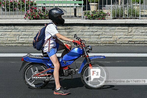 Teenager with tuned moped  Switzerland  Europe