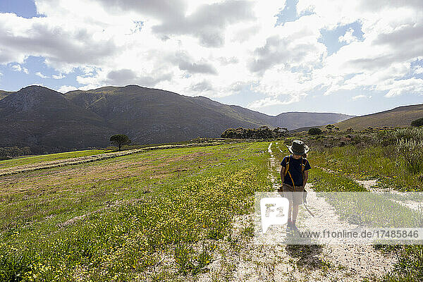 Young boy walking  Stanford Valley Guest Farm  Stanford  Western Cape  South Africa.