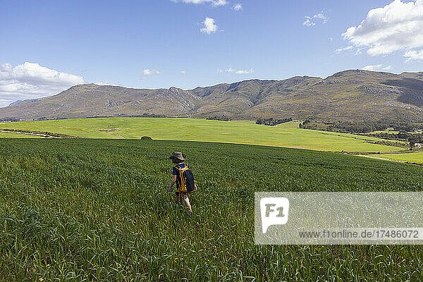 Young boy walking  Stanford Valley Guest Farm  Stanford  Western Cape  South Africa.