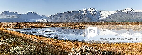 Reflection in a lake  view of glacier tongues and mountains  glacier tongues on the Vatnajökull glacier  Mount Kristínartindar  Vatnajökull National Park  Austurland  Iceland  Europe
