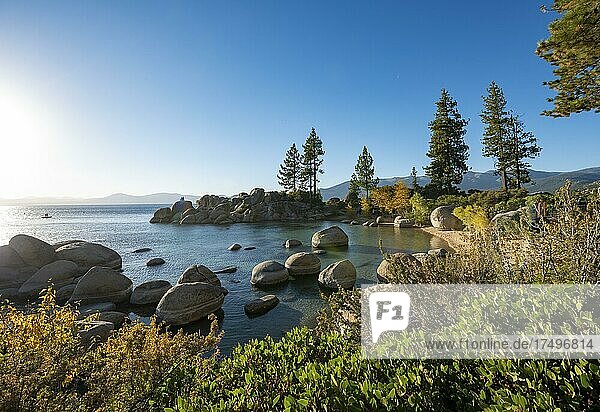 Bay with sandy beach and round stones in the water  Bay at Lake Tahoe  Sand Harbor Beach  in autumn  Sand Harbor State Park  shore  California  USA  North America