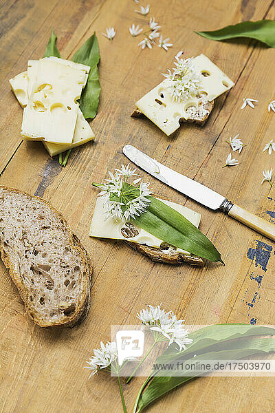 Sandwiches with cheese and ramson leaves and flowers