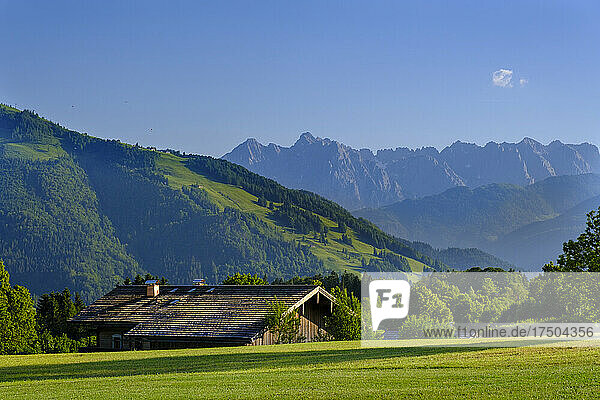 Germany  Bavaria  Reit im Winkl  Lone mountain hut in scenic Chiemgau Alps