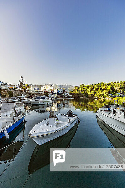 Greece  Crete  Sissi  Boats moored in marina of coastal village