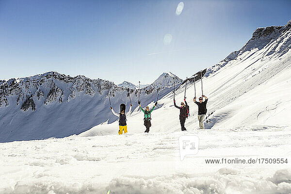 Group of happy friends on a ski tour in winter  Achenkirch  Austria