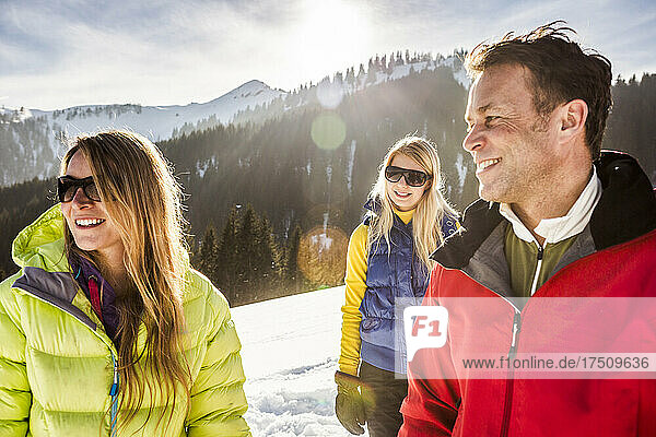 Portrait of smiling friends in winter landscape  Achenkirch  Austria