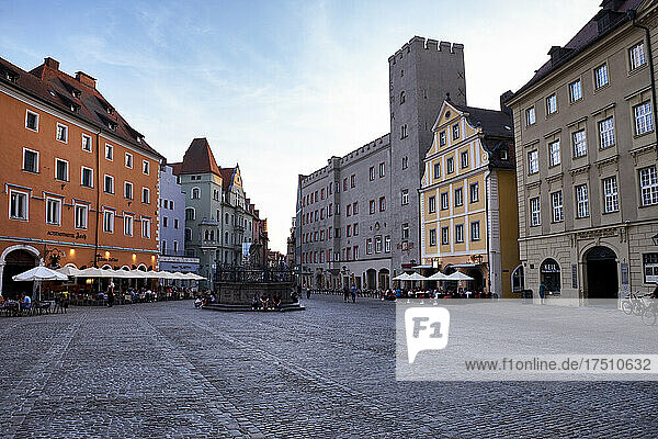 Town square amidst buildings against sky in city  Regensburg  Germany