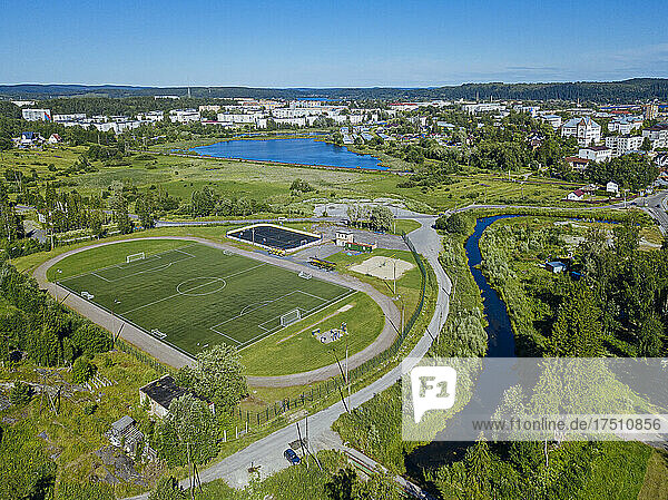 Russia  Republic of Karelia  Sortavala  Aerial view of riverside football field in summer