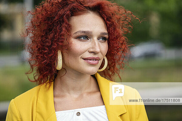 Beatiful woman with red curly hair  portrait