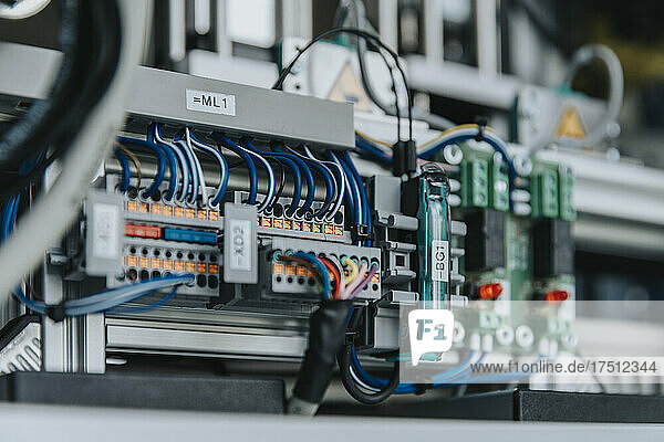 Close-up of electrical equipment with cables in laboratory at factory