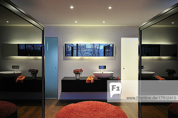 Bathroom and part of bedroom in modern home