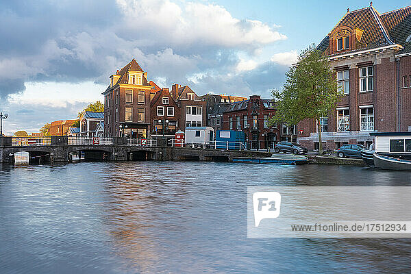 Netherlands  South Holland  Leiden  Bridge and houses in old harbor by Galgewater