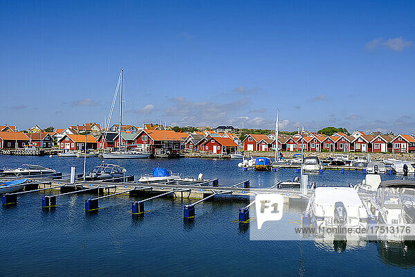 Sweden  Vastra Gotaland County  Vajern  Boats moored in marina of coastal town in summer