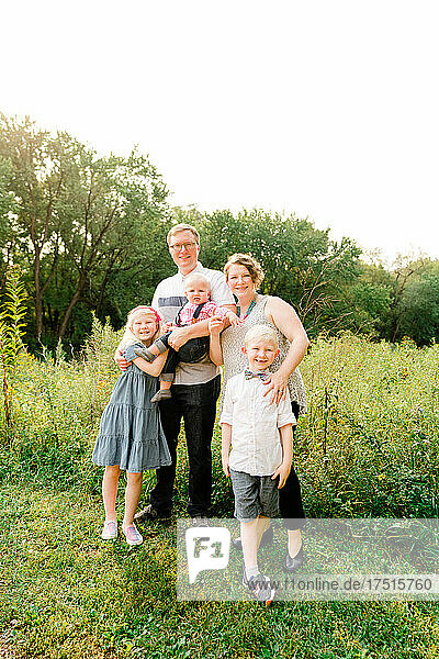 Outdoors portrait of a family of five