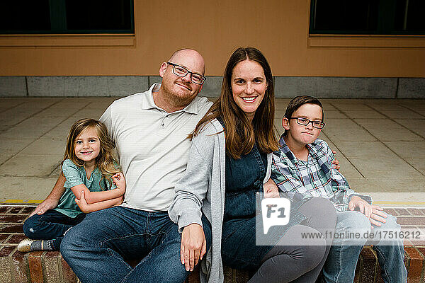 Family of Four Smiling for Camera in San Diego
