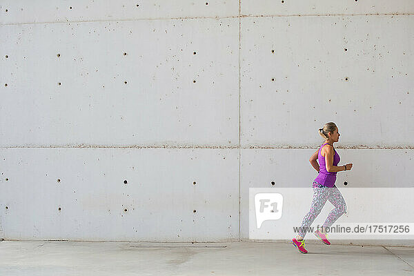 Sporty Woman Running. Fitness  Workout  Sport  Lifestyle Concept.