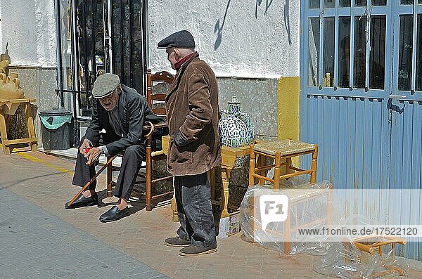 Old men in front of a chair shop  Nijar  Andalusia  Spain  Europe