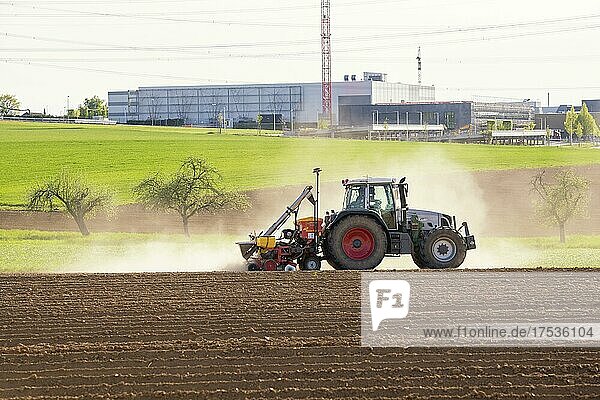 Tractor with seed drill in the field in spring  Baden-Württemberg  Germany  Europe
