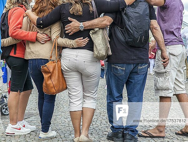 Friends and couples hugging for a souvenir photo  Berlin  Germany  Europe