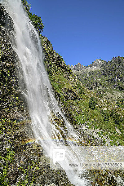 Rainbow over waterfall on mountain at Cascade de Sillans  Sillans-la-Cascade  Ecrins National Park  France