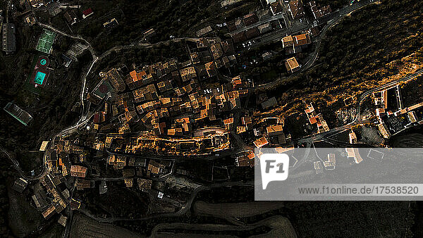 Spain  Province of Huesca  Estopinan del Castillo  Aerial panorama of mountain town at dusk