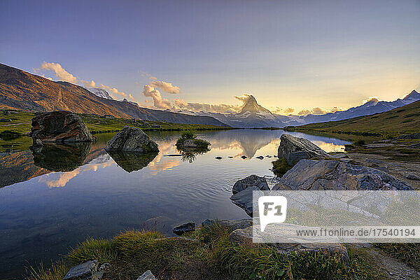 Scenic view of Stellisee lake with Matterhorn mountain at sunset  Zermatt  Switzerland