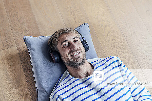 Man with headphones relaxing at home