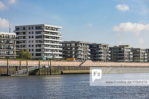 Germany  Bremen  Waterfront apartments along Weser river canal