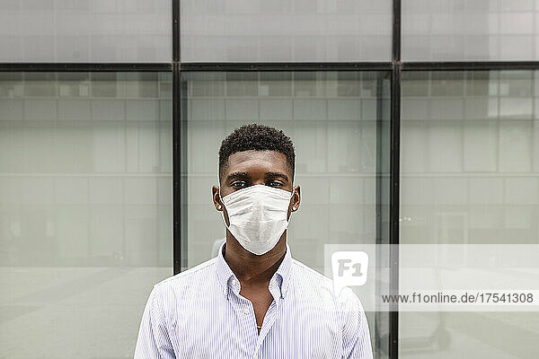 Young man wearing protective face mask