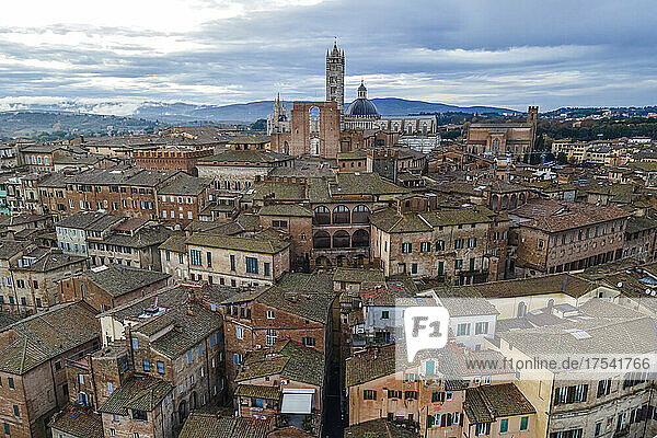 Italy  Siena  Drone view of historic old town with Siena Cathedral in background