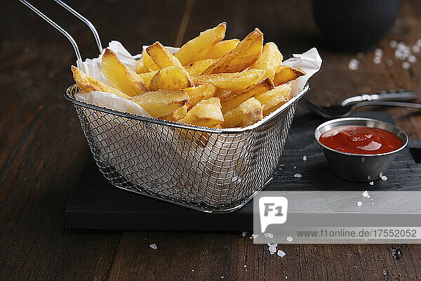 Homemade chips with raspberry ketchup