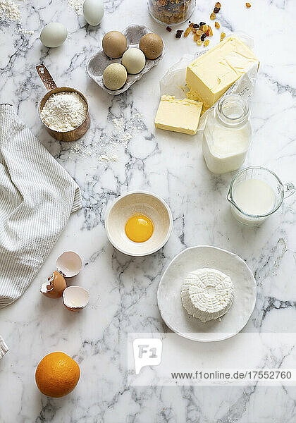 Baking ingredients: eggs  butter ricotta  flour  milk