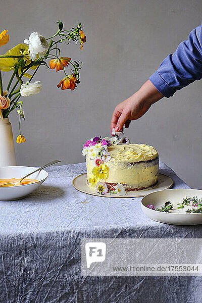 A festive layer cake decorated with flowers
