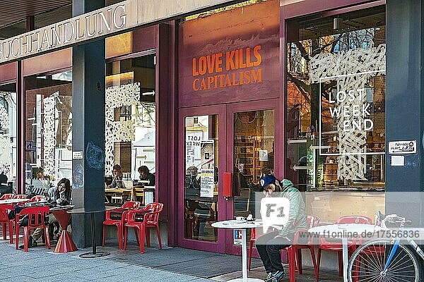 Bookshop with integrated café  slogan -love kills capitalalism- Munich  Bavaria  Germany  Europe