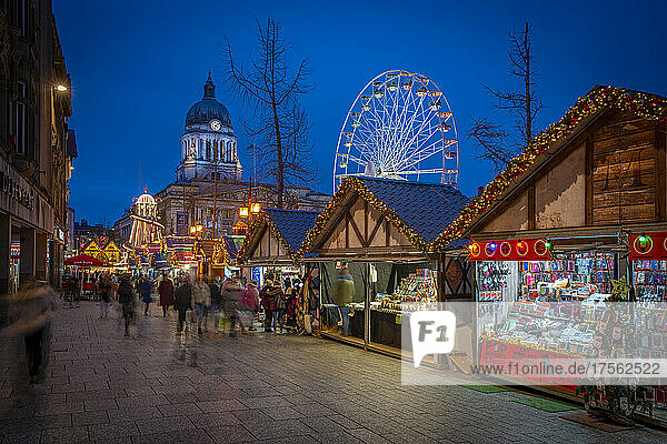 View of Christmas market stalls  ferris wheel and Council House on Old Market Square  Nottingham  Nottinghamshire  England  United Kingdom  Europe