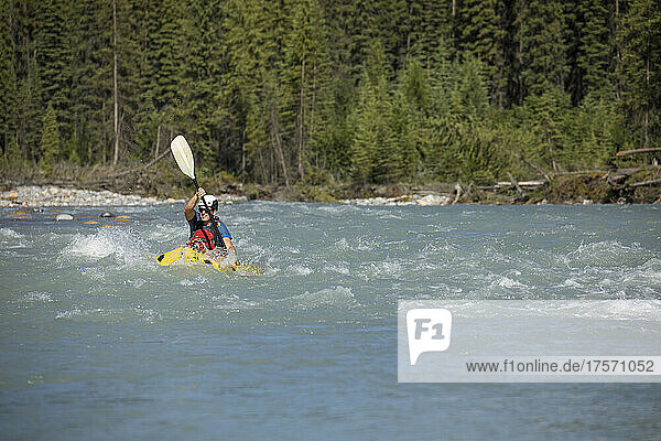 Paddler tackles rapids on the Kootney River  B.C.
