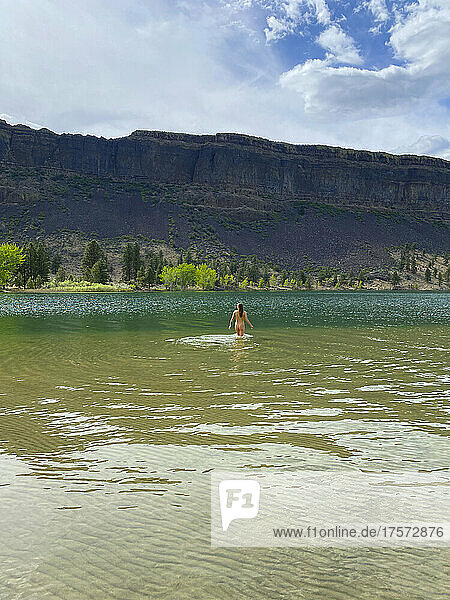 Naked female going for a swim in Banks Lake