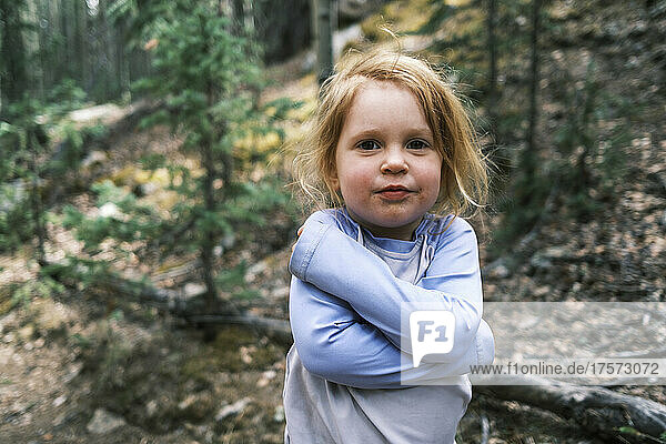 Young girl in the woods in Colorado