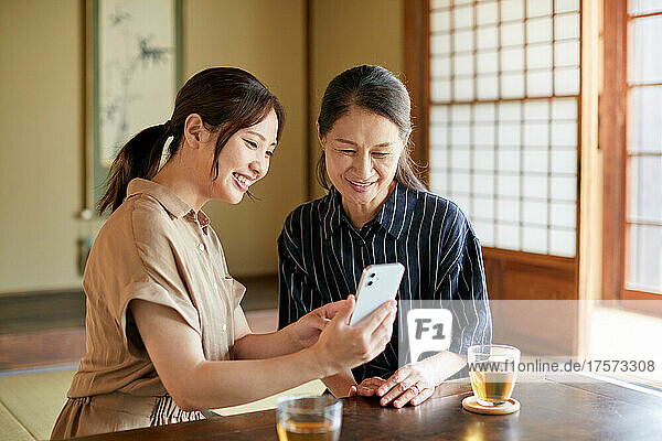 Japanese Senior Lady Who Teaches Me How To Use Smartphone