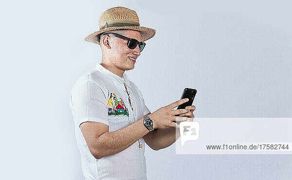 Man with beach hat with his cell phone  man with glasses typing a message