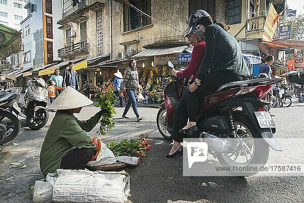 Flower seller in the city  Hanoi  Vietnam  Asia