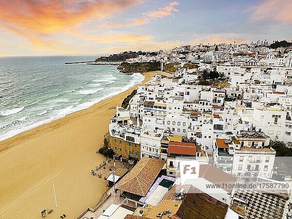 Aerial view of whitewashed architecture of Albufeira by the Atlantic Ocean at sunset  townscape  Algarve  Portugal  Europe