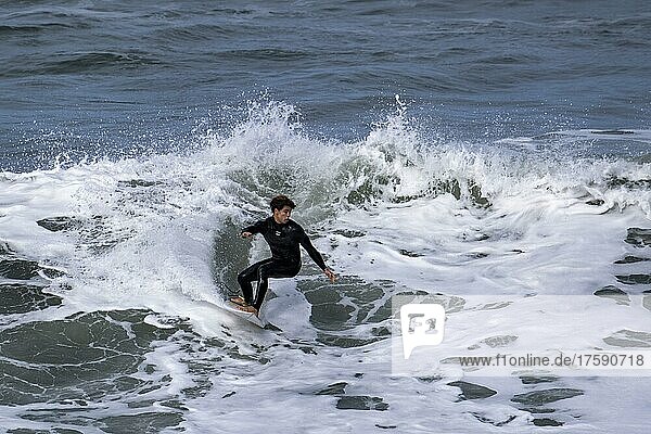 Surfer in wave on Atlantic Ocean  Madeira  Portugal  Europe