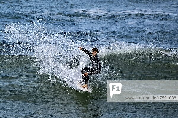 Surfer in wave on Atlantic Ocean  Madeira  Portugal  Europe