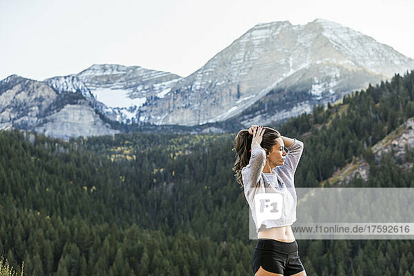 United States  Utah  American Fork  Athlete woman looking at view in mountain landscape
