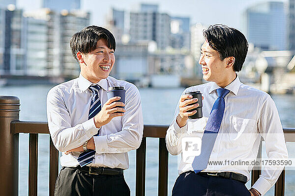 Japanese Businessmen Chatting